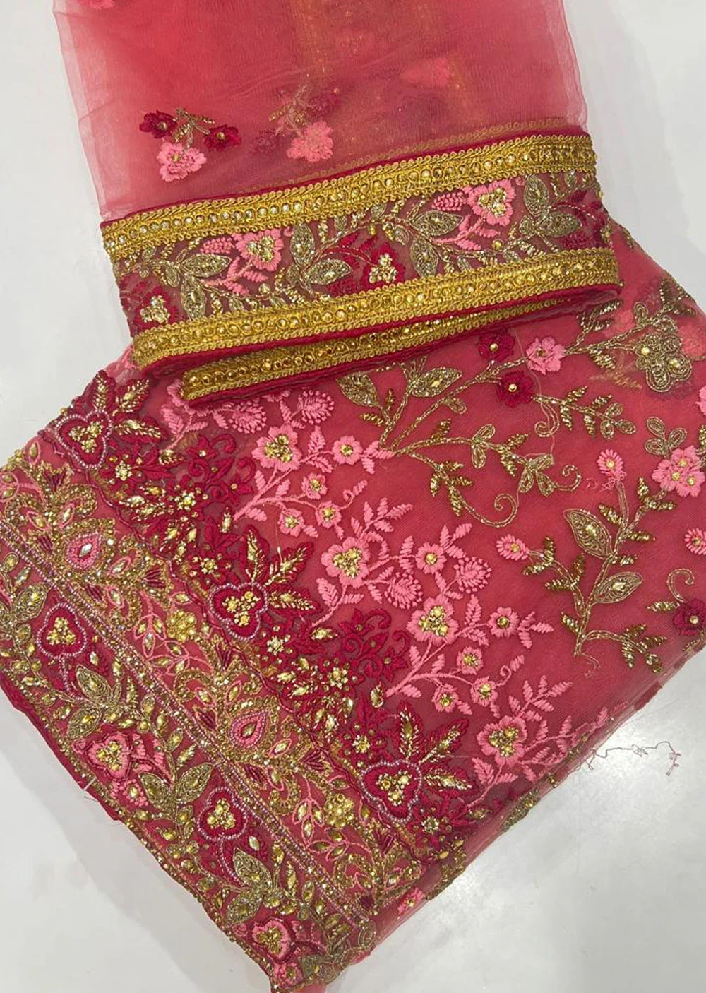 OP100128 Coral Unstitched Fancy Net Suit